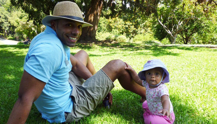 father and baby at picnic