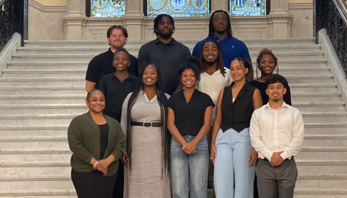 Intern group photo on State House Stairs