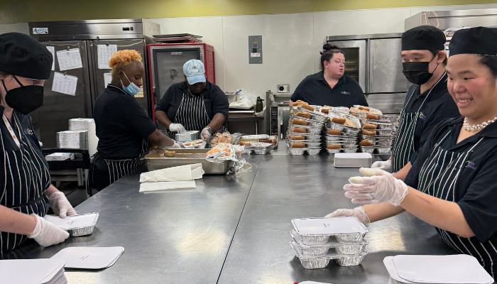 kitchen photo of ETC while they are preparing lunches 