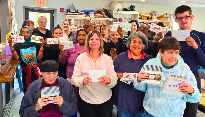 Group photo of individuals at ETC posing 