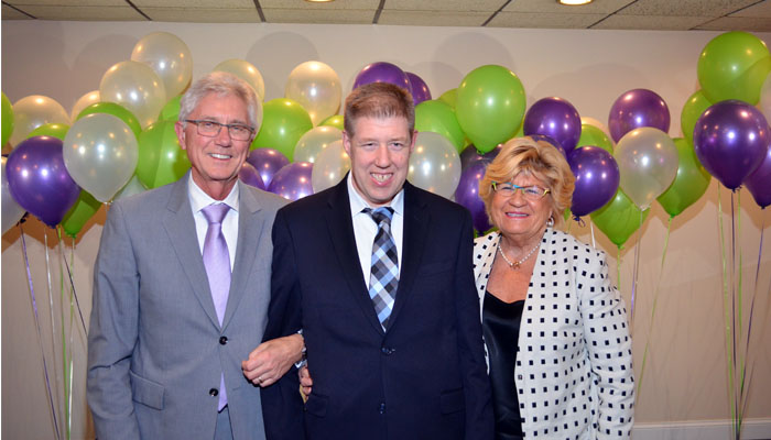 Parents and son at gala