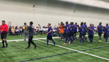 Soccer players on indoor turf