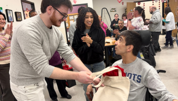 A till stuff member with an Individual