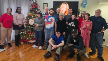 Group photo of individuals and staff for the holidays