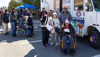 A group of individuals getting ice cream together 