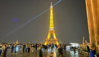 eiffel tower lit up at night